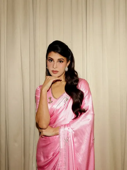 It was a pleasure styling the graceful Jacqueline Fernandez in this lustrous pink satin saree. I focus on creating looks that enhance your personal style, whether it's for a red carpet event or an intimate celebration.