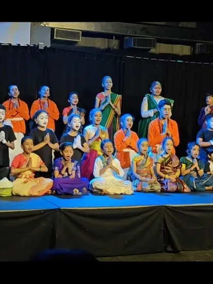 The entire cast of the summer camp showcase takes a moment of gratitude on stage. We teach our students the importance of acknowledging their hard work and the support of their team and audience.
