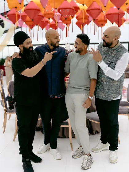 The crew in Tuscany, pointing to the man of the hour. We're more than just vendors, we're a team that has fun and brings great energy to every event.