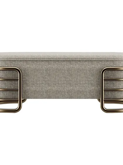 The Luna bench, featuring a fabric top and a unique base made of curved metal tubes. This piece is available in various finishes, including anodic bronze and glossy gold, to suit any interior.