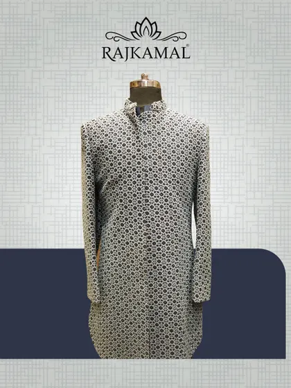 Another mannequin shot of the black and white patterned jacket, showing its clean lines and elegant design.