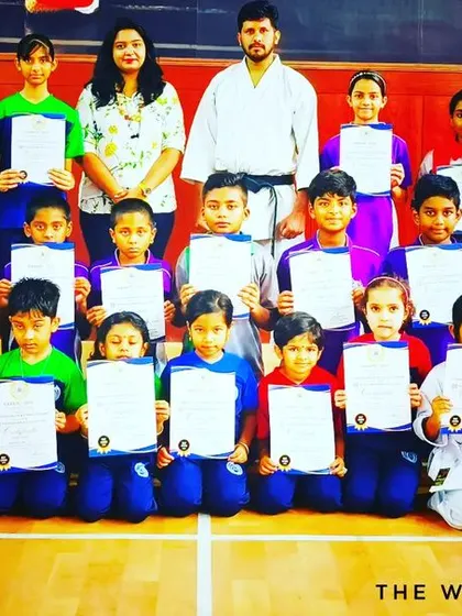 A slightly different angle of our successful students. Each certificate is a symbol of their hard work and progress.