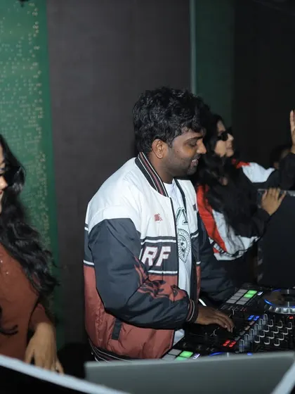 Another angle from the same event, focused on the music. The party is in full swing and the vibes are great.