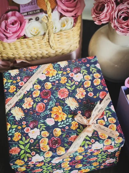 The elegant floral wrapping of our "Good Vibes, Good Life" Mother's Day hamper, tied with a custom ribbon.