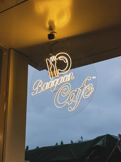 A close-up of our neon sign. The simple, elegant design reflects our approach: good food and a great atmosphere.