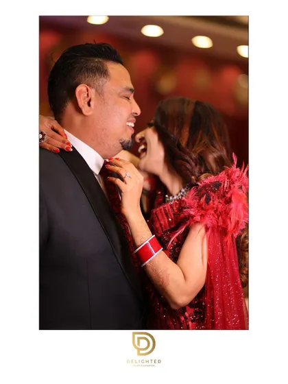 Another angle of the laughing couple, showing their natural chemistry and the happiness they share. Candid photography like this is my specialty.