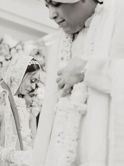 A black and white version of a ceremony moment, adding a timeless and classic feel to the memory.