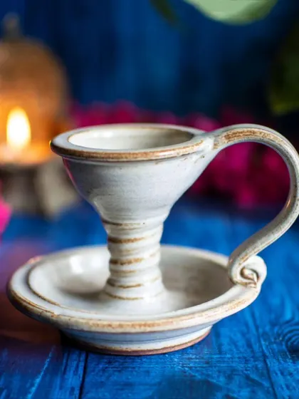 This handcrafted ceramic incense lamp is one of my personal favorites. Its timeless, classic design allows it to be styled in both festive and elegantly minimal settings, making it a versatile addition to your living room or prayer rituals.