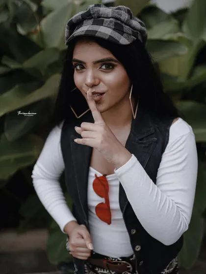 A duplicate of image 63, a cheeky and stylish portrait that showcases the model's personality.