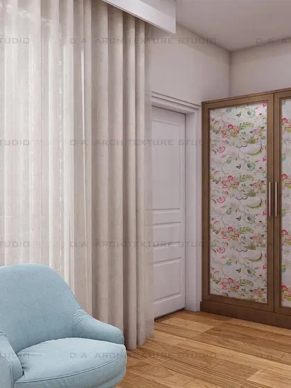 This view shows the floral-patterned wardrobe, adding a touch of vintage charm to this sweet and playful kids' room.