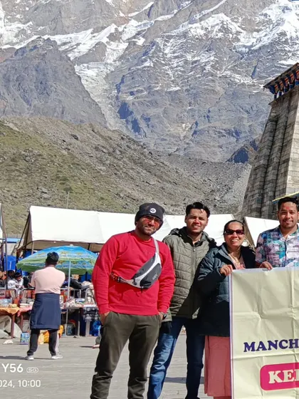 Our team with a happy group of travelers right in front of the Kedarnath temple. We are not just an agency; we are your travel partners, on the ground with you at every step of your spiritual journey.