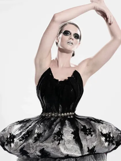 Inspired by the black swan, this look was created for Vandana Fabrics. The dramatic makeup and the sculpted, non-stitched garment made of black lace and tulle bring a dark, balletic elegance to life.
