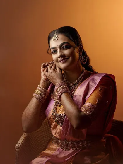 Varsha's engagement look. The soft lighting creates a beautiful, dreamy effect, highlighting her flawless makeup.