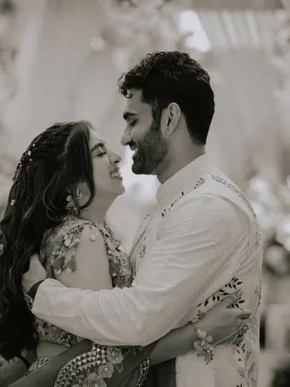 A black and white portrait filled with laughter and joy. Capturing the genuine happiness between a couple is at the core of what we do.