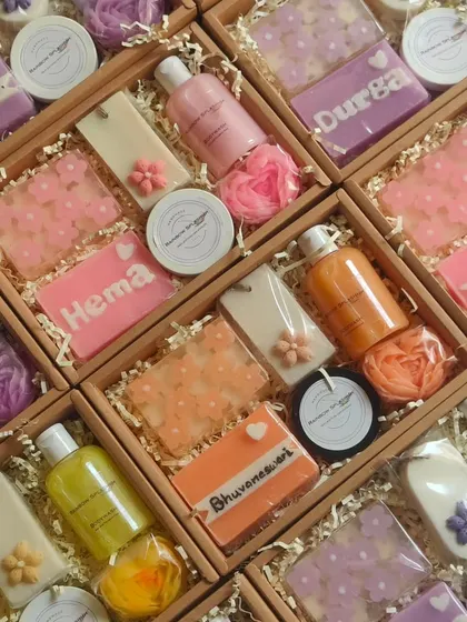 An inside look at the personalized Women's Day hampers, showing the custom name soaps and coordinated products.