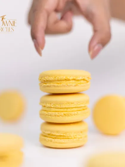 Sunshine in a bite. Our Mango Macarons are delicate, chewy, and filled with a sweet and tangy mango ganache. They are a perfect taste of summer.