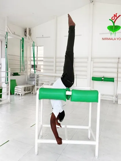 An inversion with a prop like this is incredibly beneficial. It helps with varicose veins, improves heart function, stimulates the thyroid, and can even help with gynecological issues like PCOD, all while feeling supported.