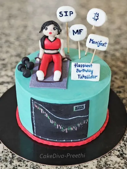A full view of the unique, multi-themed cake celebrating a client's diverse interests in fitness and finance. The cake itself was a decadent chocolate hazelnut flavor.