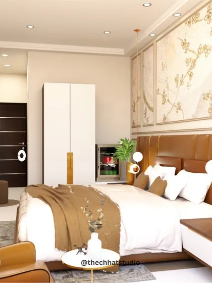 Another view of this luxurious master bedroom, highlighting the integrated vanity area and wardrobe. The design ensures a seamless flow, with consistent use of warm tones and elegant finishes to create a cohesive and restful environment.