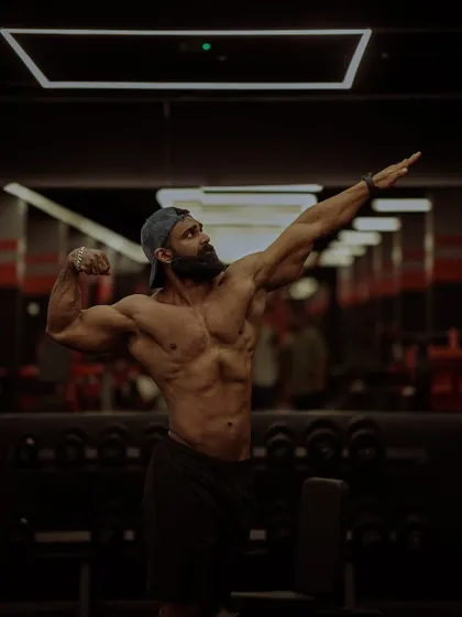 An aesthetic pose that combines strength with artistic expression. Posing is a skill in itself, requiring control and an understanding of how to present the physique in its best light.