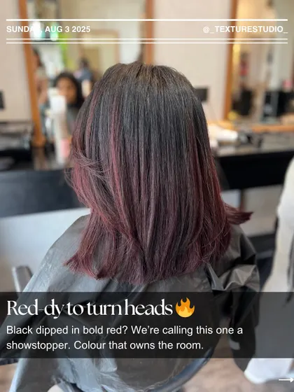 Ready to turn heads. Black hair dipped in bold red is a showstopper. This is color that owns the room.