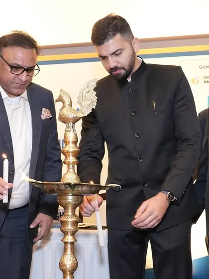 Another moment from the lamp lighting ceremony, a tradition that marks the beginning of an auspicious and knowledge-sharing event.