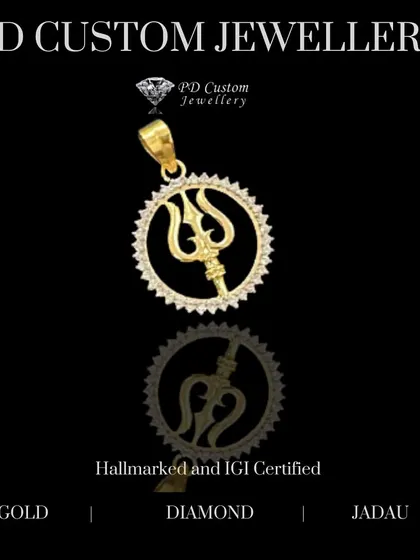 A powerful and symbolic gold and diamond Trishul pendant. The trident of Lord Shiva is set within a circle of sun-like rays, creating a stunning design.