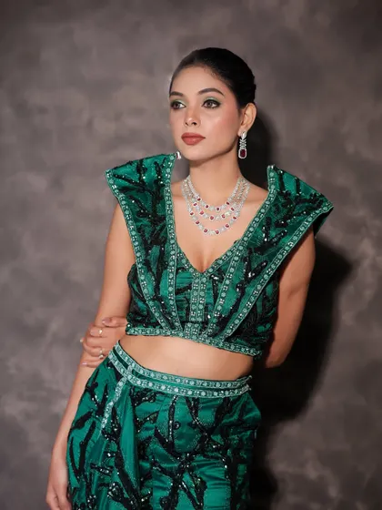 A full-length shot of the cocktail look.