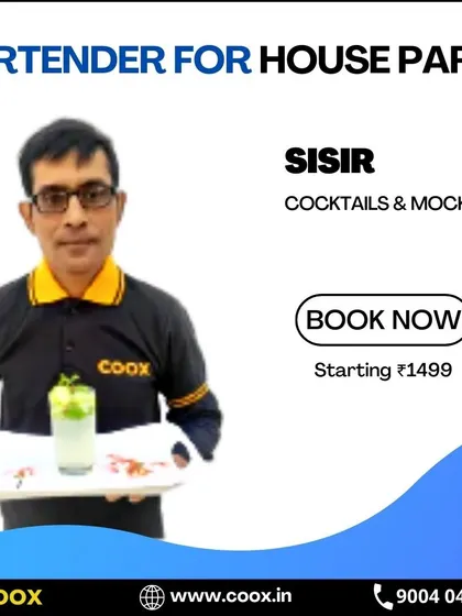 Meet Sisir, one of my professional bartenders, serving a refreshing mocktail. I ensure my team can cater to all guests, whether they prefer cocktails or non-alcoholic beverages.