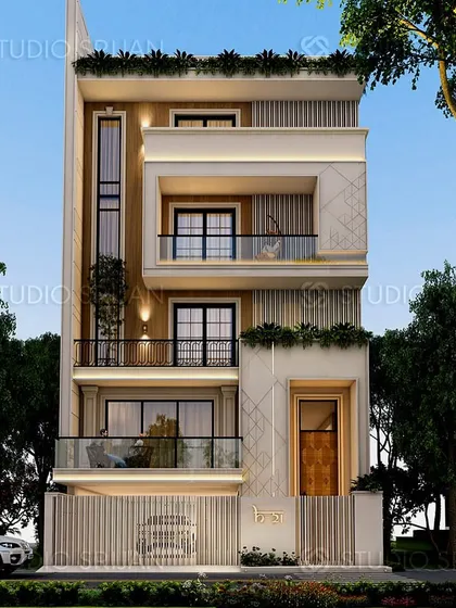 A 200 sq. yard home in Kirti Nagar, New Delhi, featuring a balanced composition of materials and forms. The design includes recessed balconies and a prominent door frame, adding depth to the facade.