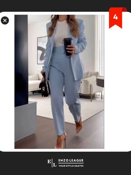 A monochromatic suit set, like this powder blue ensemble, is a modern approach to power dressing. It's a statement look that is both feminine and authoritative, perfect for standing out in the corporate world.