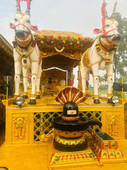 I specialize in decorating procession chariots (Ratha Gadi), creating elaborate mobile stages with deity statues, like this one featuring Lord Shiva and Nandi.