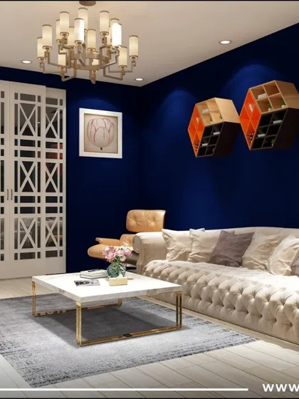 A different angle of the eclectic living room, showing the striking contrast between the deep blue wall and the white tufted sofa.