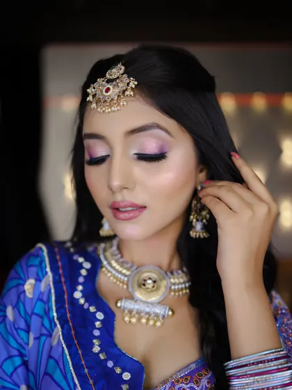 Grace, charm, and a hint of royal elegance. This blue traditional look was created for a diploma class demonstration.