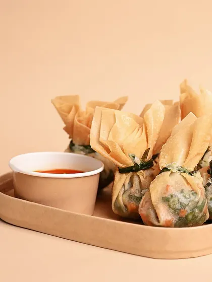 Money Bags for good luck and a good mood. These crispy, savory dumplings are a fun and delicious addition to any party menu.