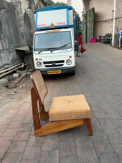 A single 'Kangaroo' chair ready for delivery. You can see the distinct Z-shaped profile that makes this design so unique.