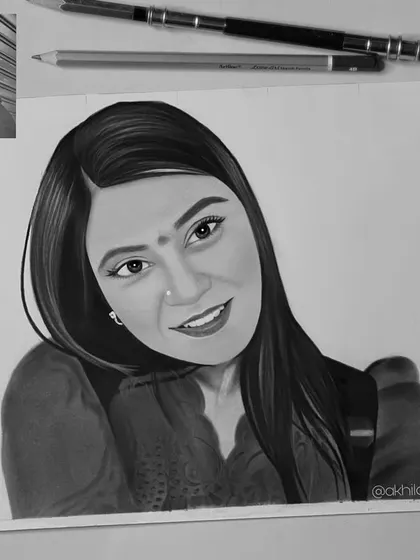A simple and beautiful A4 graphite sketch. The focus is on her happy expression, showing that sometimes less is more in a portrait.
