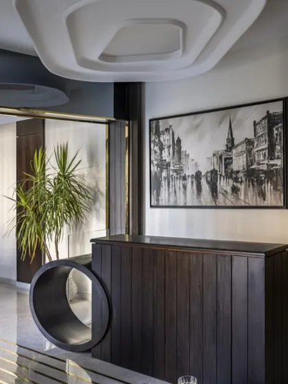 In a compact duplex, every inch matters. This hidden TV unit pops up only when needed, keeping the space sleek and clutter-free. It's a small detail that makes a big impact on modern living.