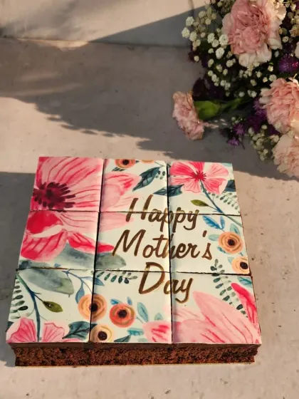 A close-up of my edible art tile brownie for Mother's Day. This gluten-free option ensures that even moms with dietary restrictions can enjoy a decadent and beautiful treat.