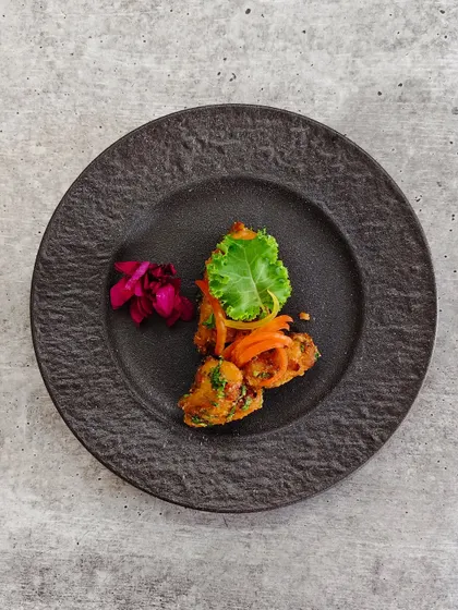From the backwaters of Kerala, we bring you a taste of its magic, served crispy in these podi fish cakes.