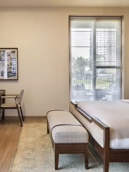 A bedroom from the Max128 project, showing a cozy and well-designed personal space.