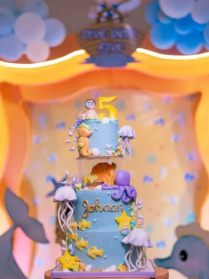The cake is the centerpiece of any birthday. This stunning, multi-tiered 'Under the Sea' cake was as much a part of the decor as it was a delicious treat.