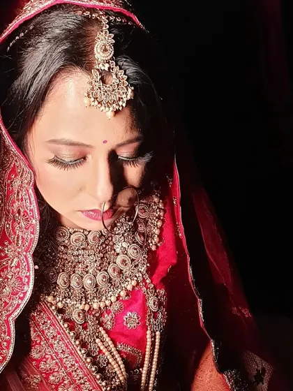 The lighting in this shot highlights the flawless HD finish of the makeup. The foundation is perfectly matched and blended, creating a smooth canvas that looks incredible both in person and on camera.