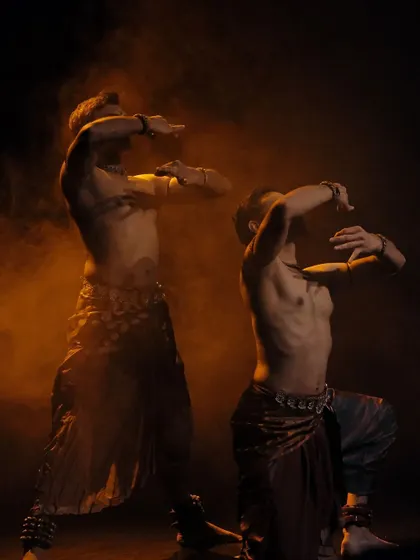 A different angle of our performance of 'ATAH', with Adithya PV and me moving in unison. The warm, smoky lighting creates a dramatic effect.