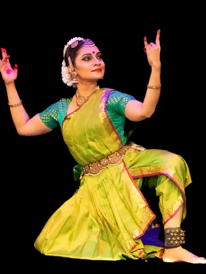 A dynamic pose from a performance at the South Asian Heritage Month Festival in London.
