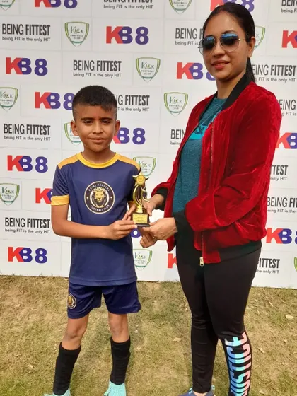 Congratulations to this young champion on being named "Player of the Match."