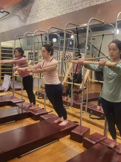 In our nurturing community, women discover the extraordinary power within their bodies. This group class on the tower system shows clients building strength and confidence together with proper guidance.
