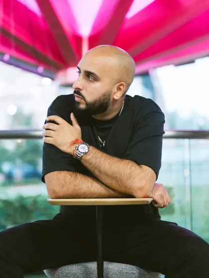 Looking to the side, thinking about the next project. The creative process never stops, and I'm always planning the next big thing.