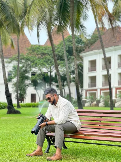 Taking a moment between shoots to review my work. Every detail matters.