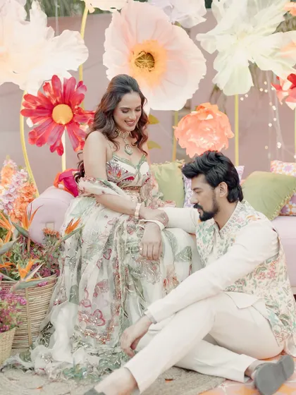 Another sweet moment between the couple. Janvi's look is effortless and elegant, perfect for enjoying the celebration.